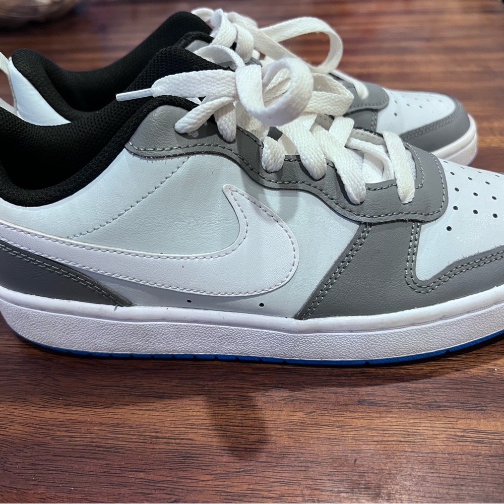 Youth size 6 court sneakers light blue,grey, and white.